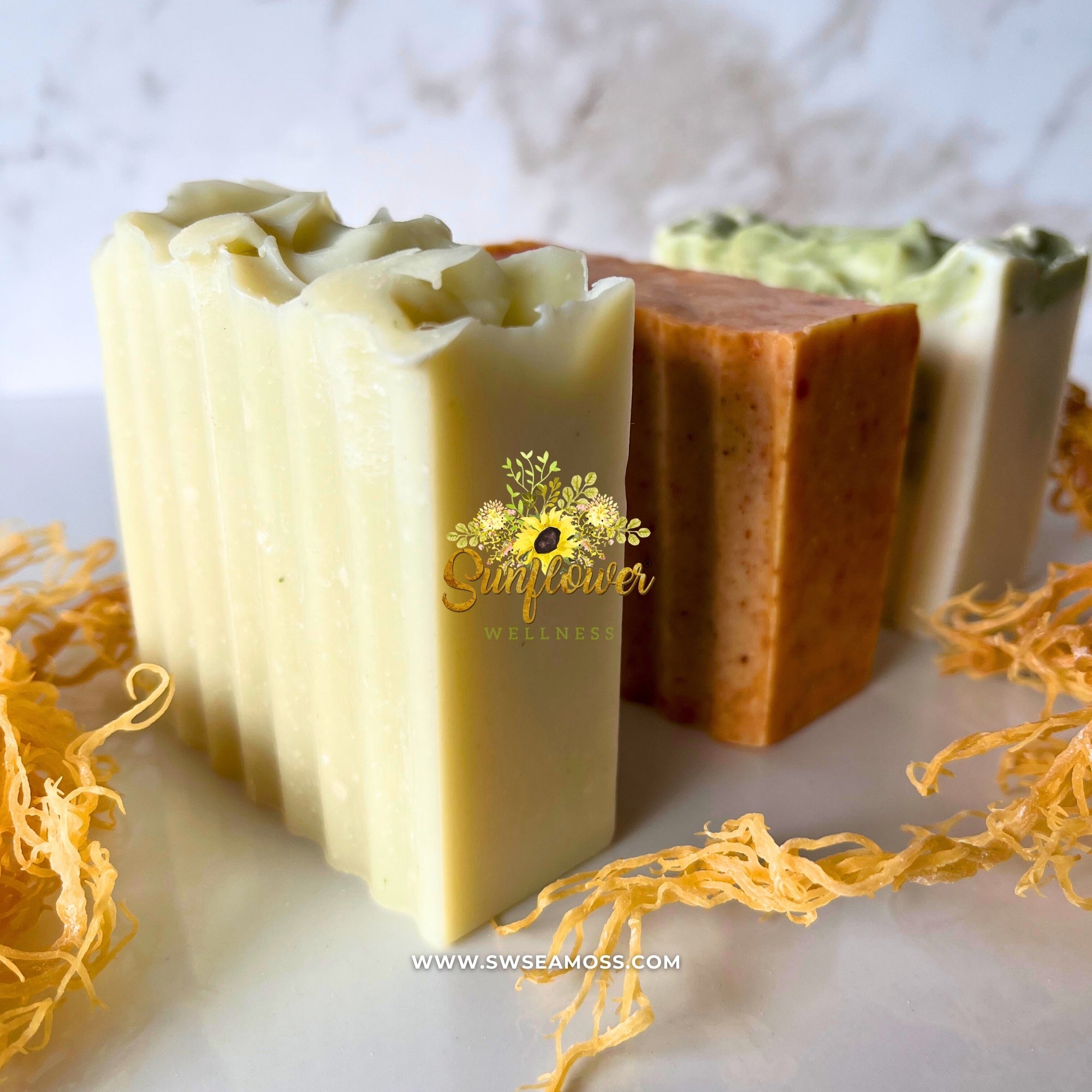 handmade sea moss soap collection by sunflower wellness featuring unscented, turmeric and more.