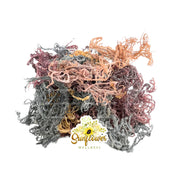 Full spectrum sea moss wildcrafted from St. Lucia with strands in gold, purple, and green hues.