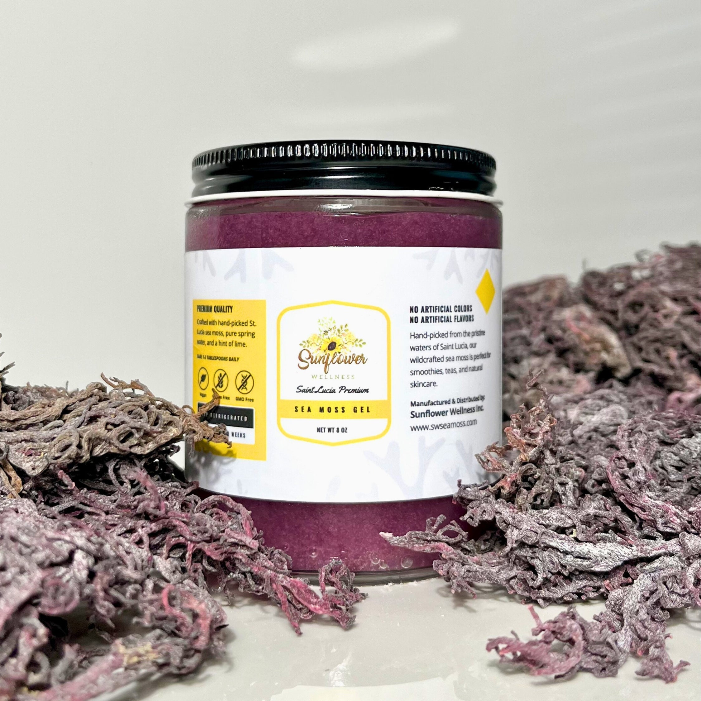Purple Sea Moss Gel by Sunflower Wellness – Wildcrafted St. Lucia Irish Sea Moss in glass jar surrounded by raw sea moss.