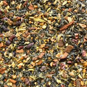 Loose leaf Daily Detox Cleanse Tea blend with green tea, orange peel, ginger, senna, cacao nibs, fennel, and pomegranate from Sunflower Wellness.